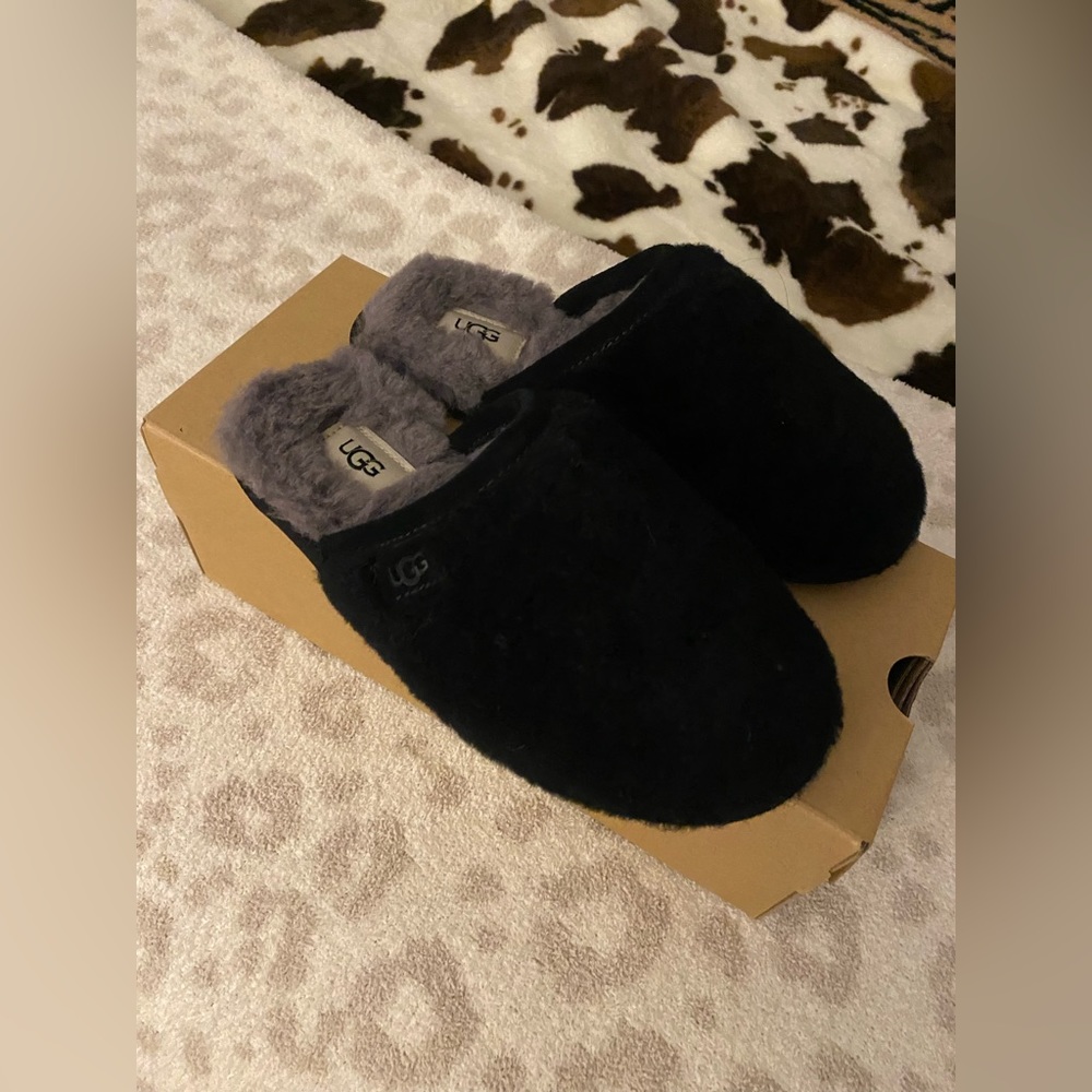 Black and grey UGG slippers